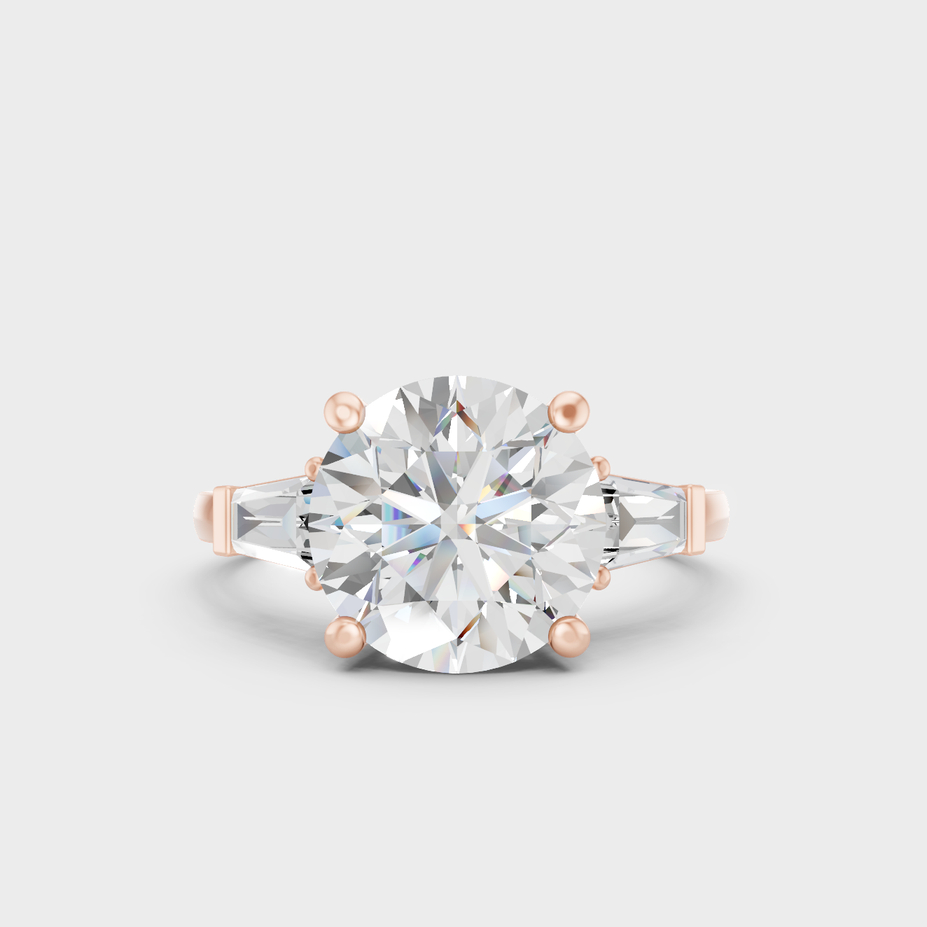 Romantic 3.32 Ct round and baguette cut lab-grown diamond three-stone ring in 18K rose gold.